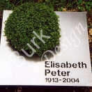 Urnengrab - Grabmal aus Edelstahl mit Schrift und Bepflanzung