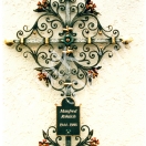 Grabkreuz aus Eisen geschmiedet, farblich bemald und vergoldet